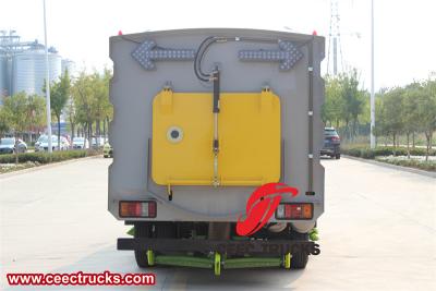 Isuzu brush type street sweeping truck