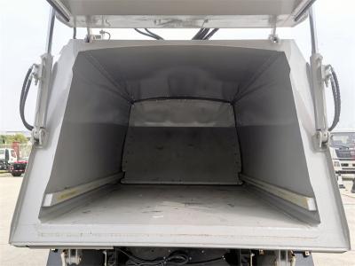 Isuzu ELF all-drive garbage rear loader